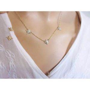 14k two tone Diamond starburst necklace and earrings